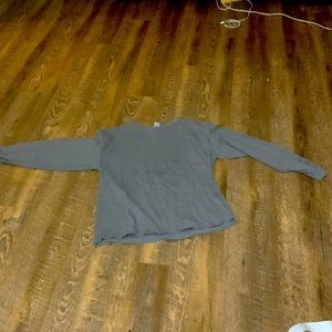Woman’s gray, long sleeve shirt